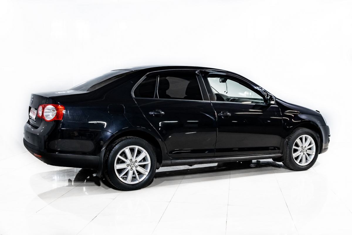 2010 Volkswagen Jetta V, Черный металлик - вид 3