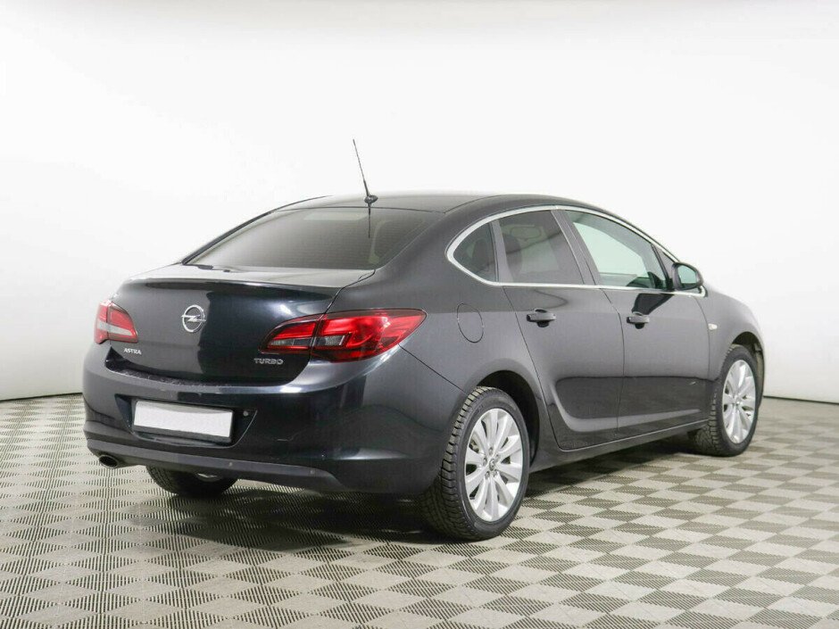 2013 Opel Astra , Черный  - вид 4