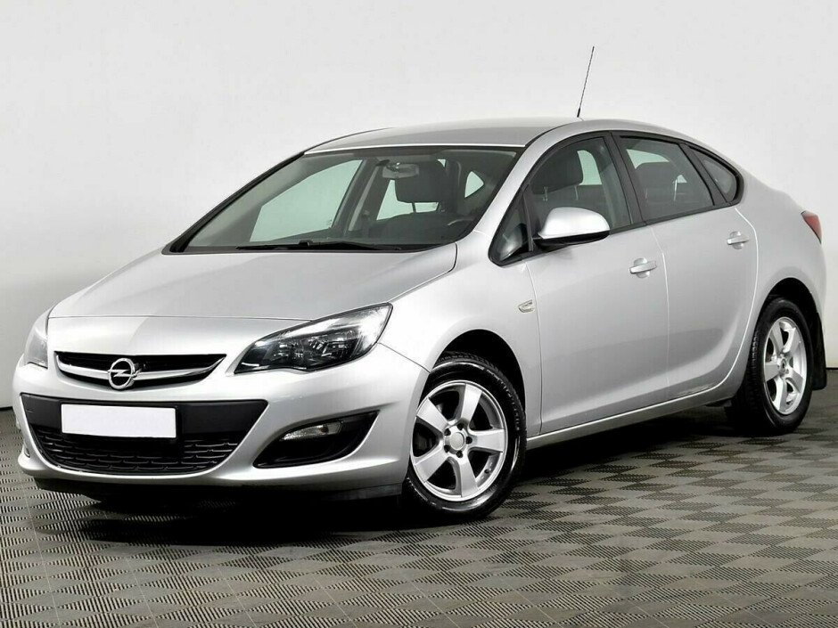 2014 Opel Astra , Серебряный  - вид 1