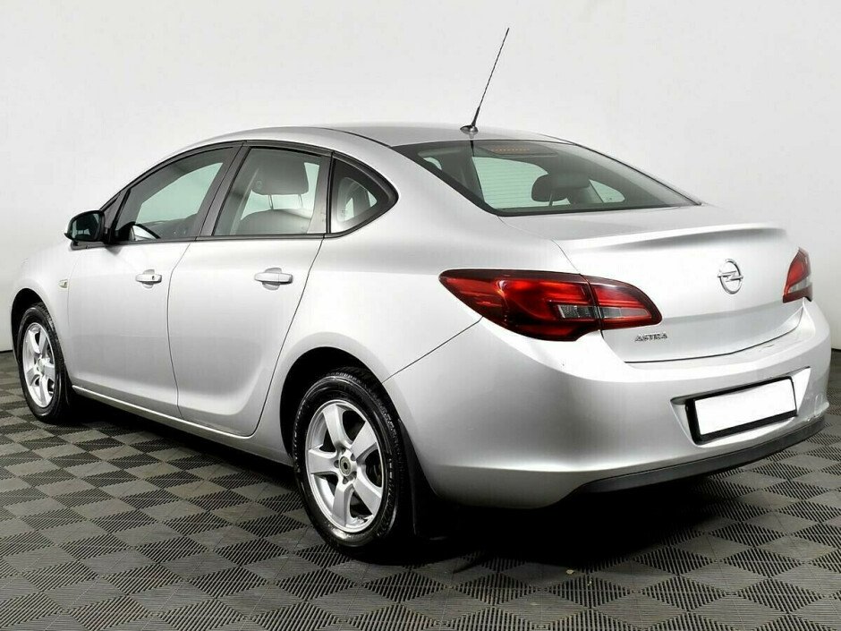 2014 Opel Astra , Серебряный  - вид 4