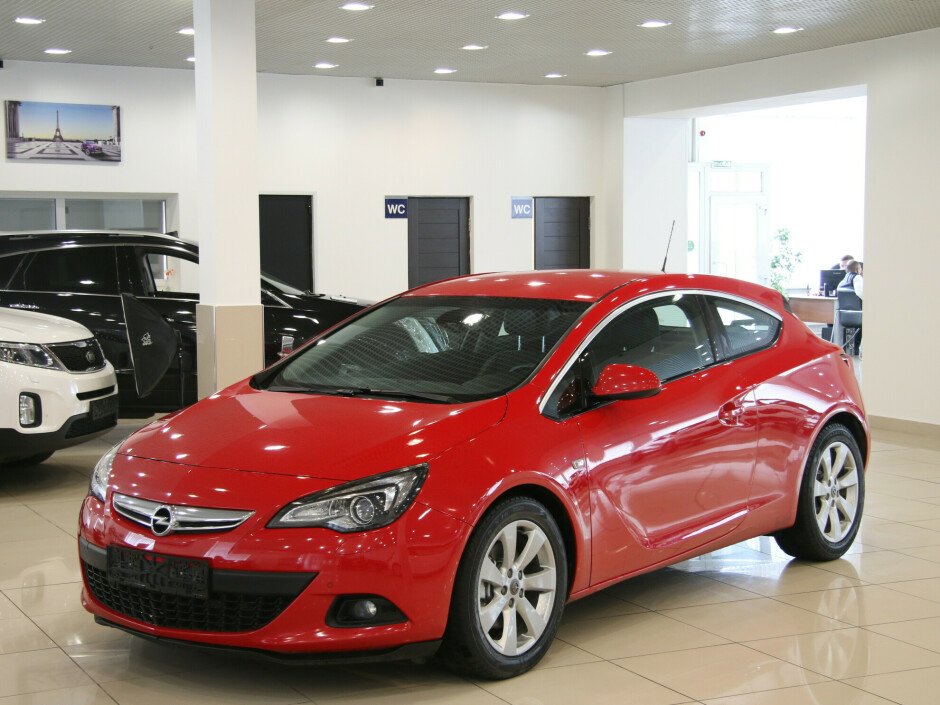 2011 Opel Astra , Красный металлик - вид 1