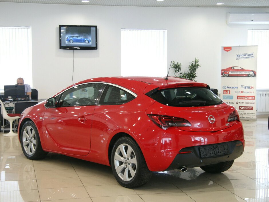 2011 Opel Astra , Красный металлик - вид 3
