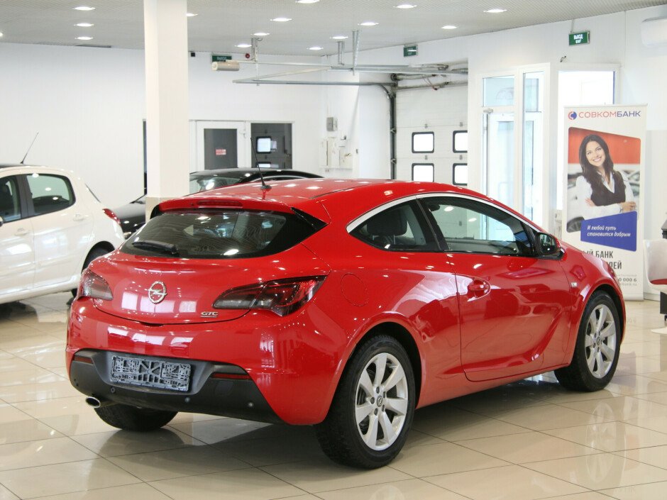2011 Opel Astra , Красный металлик - вид 4