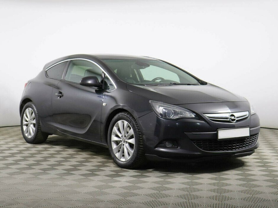 2012 Opel Astra , Черный металлик - вид 2