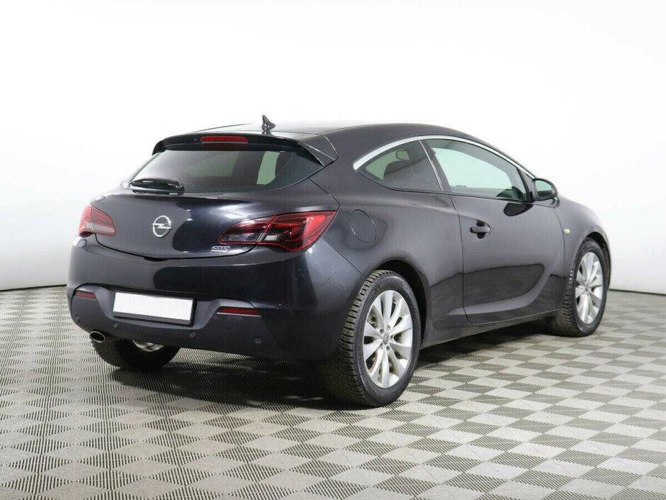 2012 Opel Astra , Черный металлик - вид 3