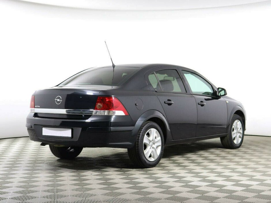 2012 Opel Astra , Черный металлик - вид 3