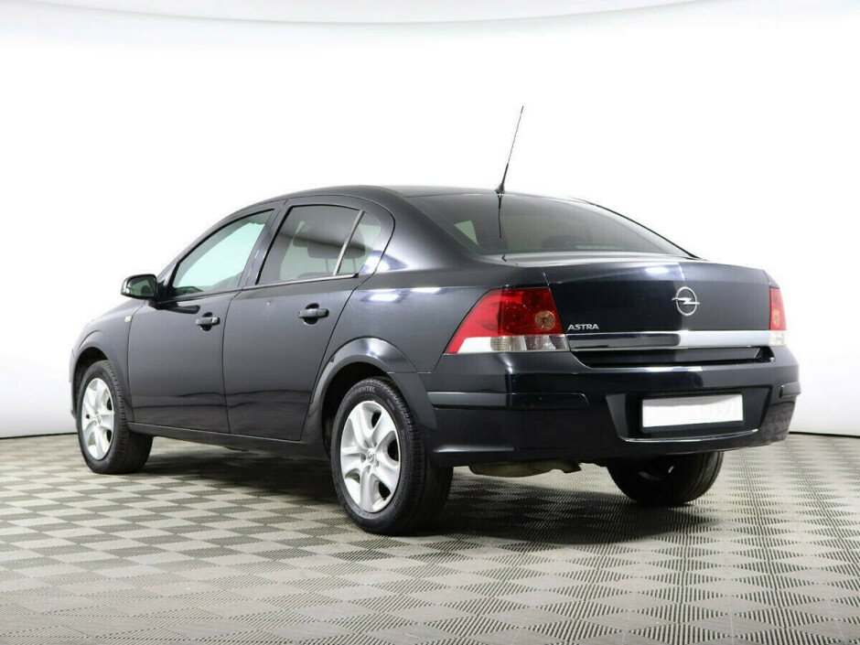 2012 Opel Astra , Черный металлик - вид 4