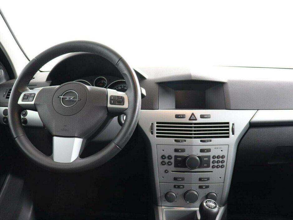 2012 Opel Astra , Черный металлик - вид 7