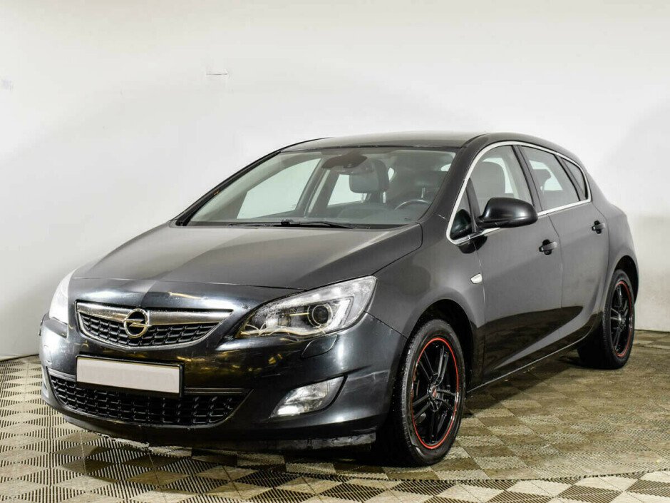 2011 Opel Astra , Черный металлик - вид 1