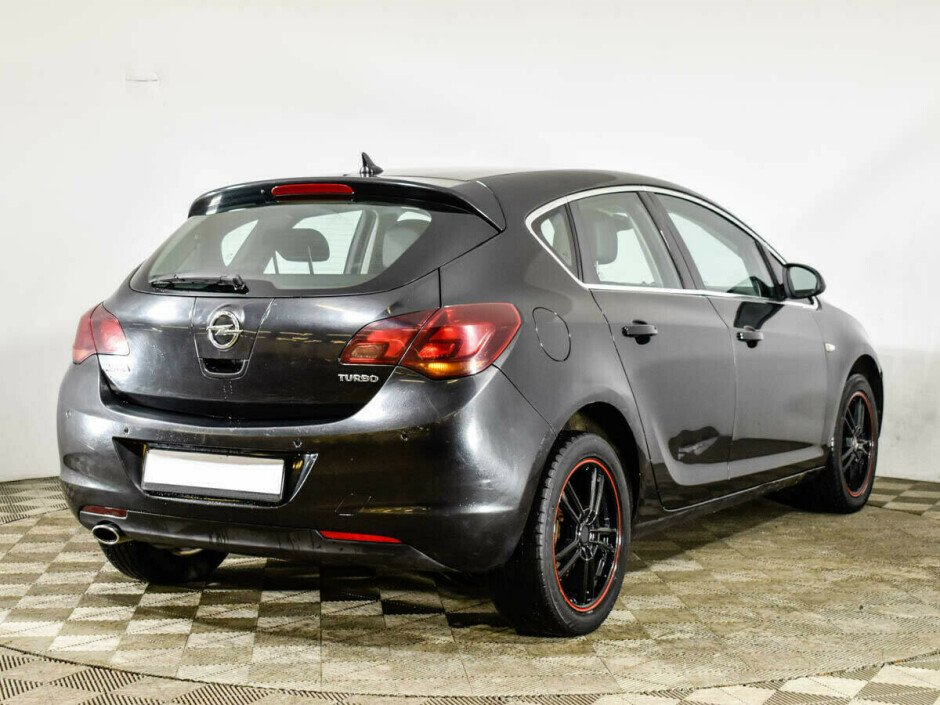 2011 Opel Astra , Черный металлик - вид 3