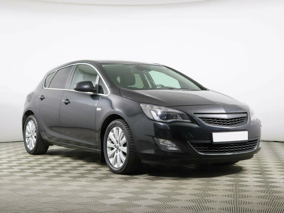 2011 Opel Astra , Черный металлик - вид 2