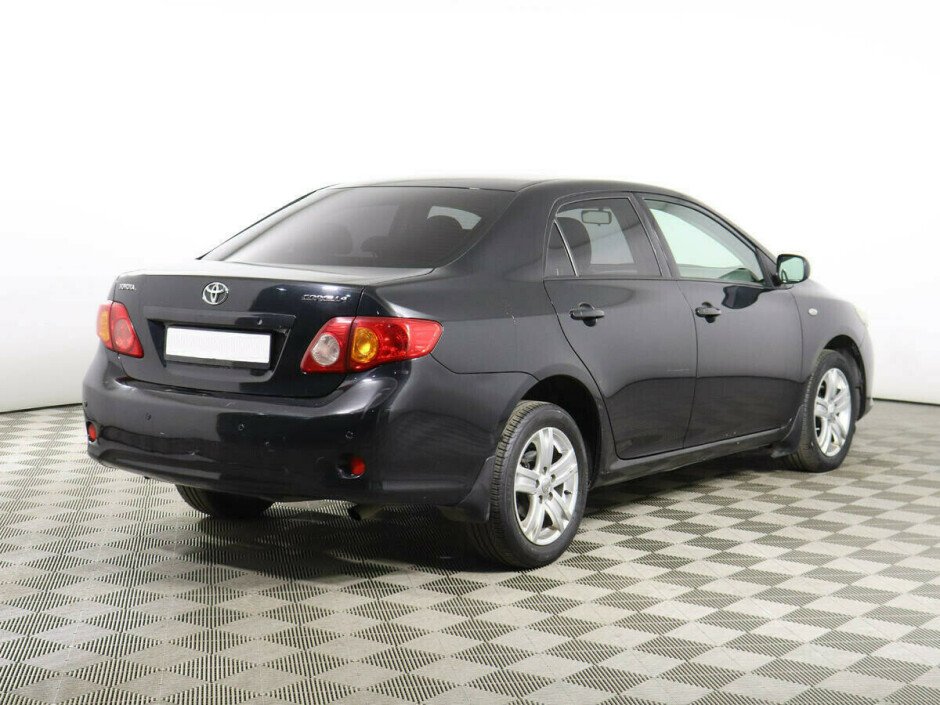 2009 Toyota Corolla , Черный металлик - вид 2