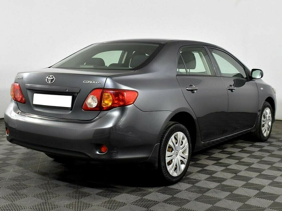 2010 Toyota Corolla , Серый металлик - вид 2
