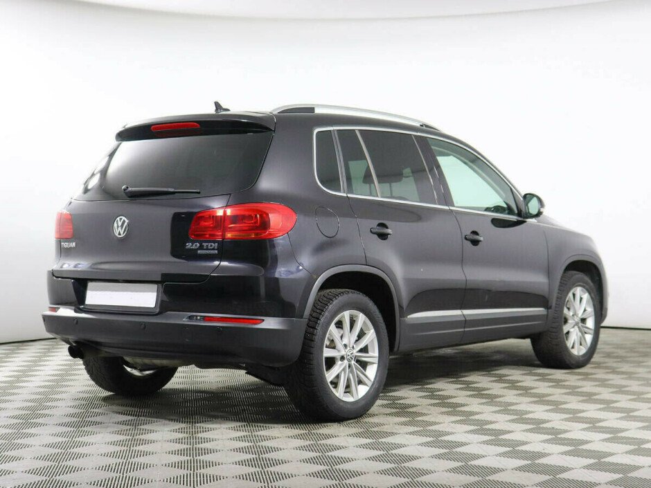 2014 Volkswagen Tiguan , Черный металлик - вид 3