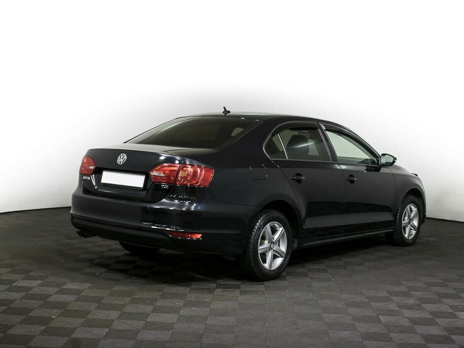 2013 Volkswagen Jetta , Черный металлик - вид 4