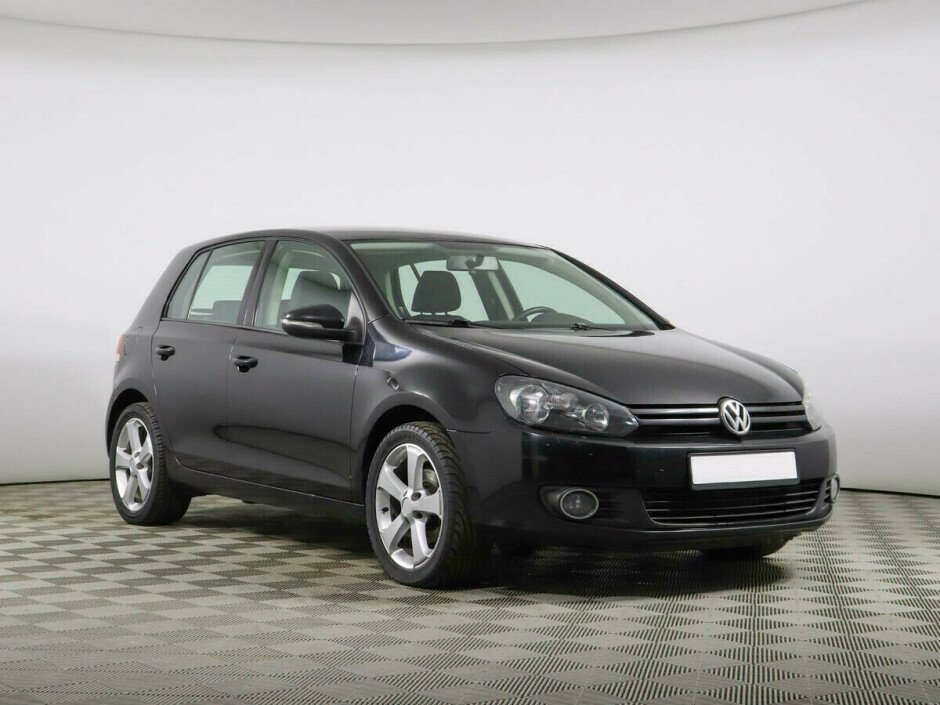 2011 Volkswagen Golf , Черный металлик - вид 2