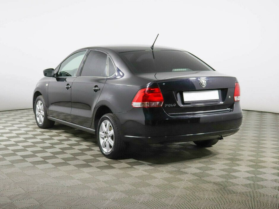 2011 Volkswagen Polo , Черный металлик - вид 3
