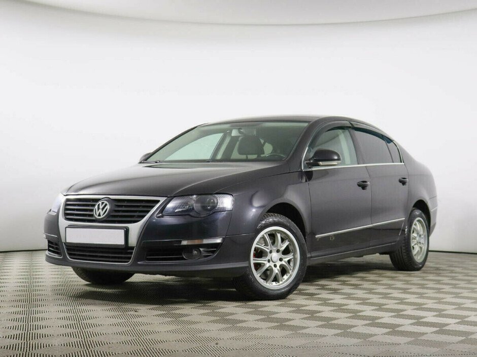 2010 Volkswagen Passat , Черный металлик - вид 1