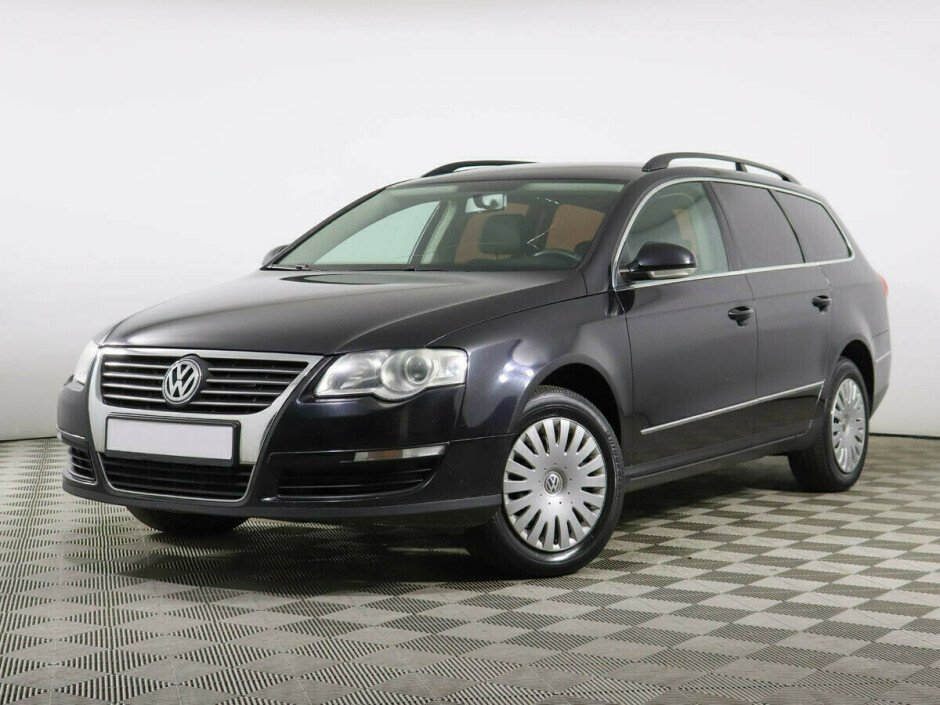 2009 Volkswagen Passat , Черный металлик - вид 1