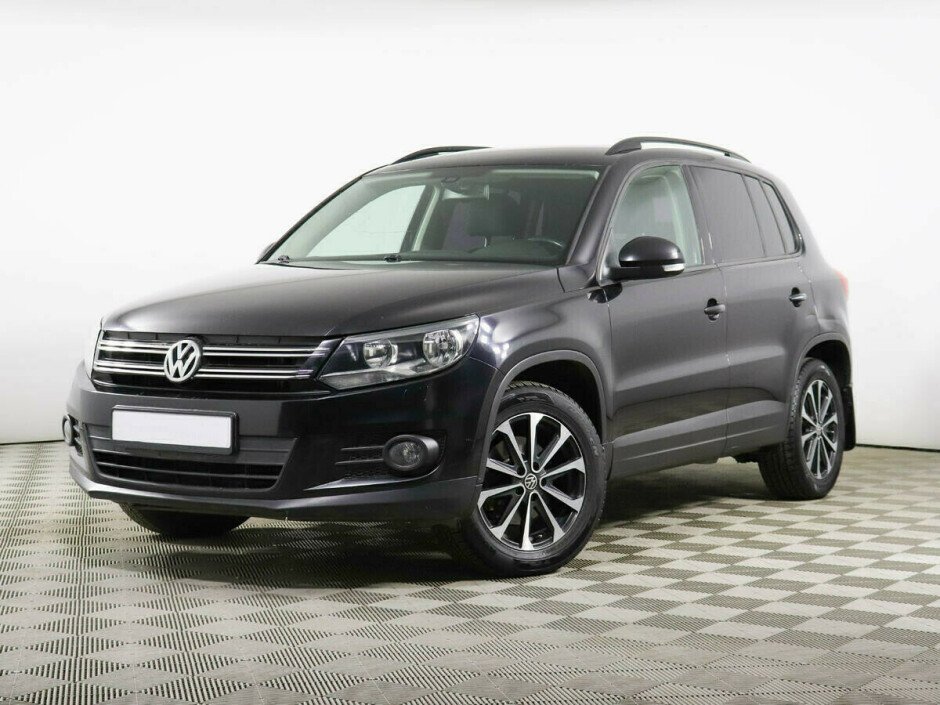 2015 Volkswagen Tiguan , Черный металлик - вид 1