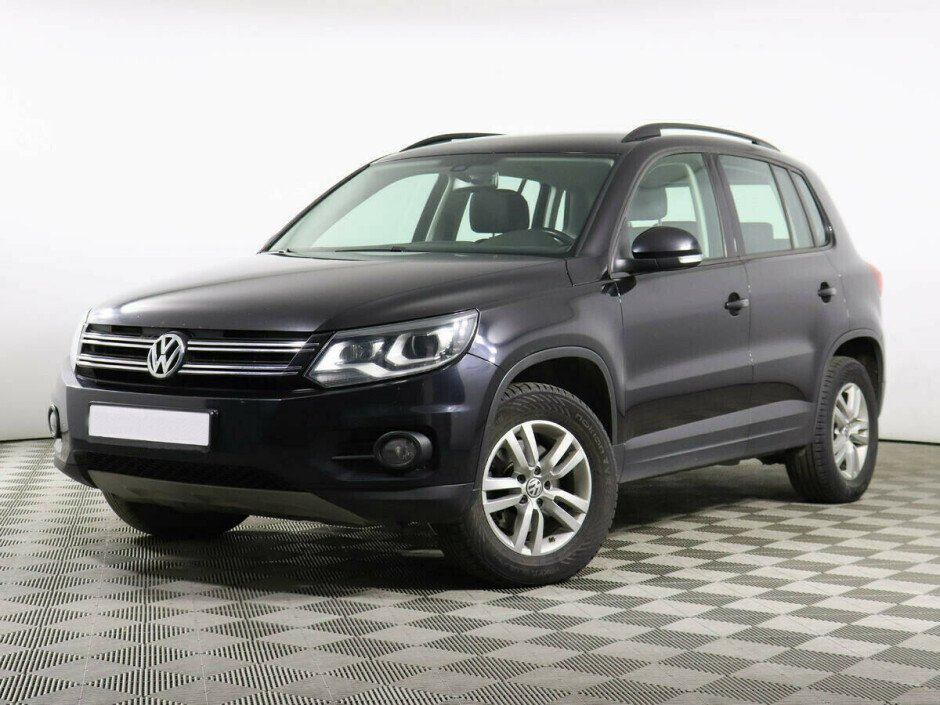 2015 Volkswagen Tiguan , Черный металлик - вид 1