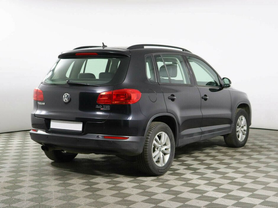 2015 Volkswagen Tiguan , Черный металлик - вид 4
