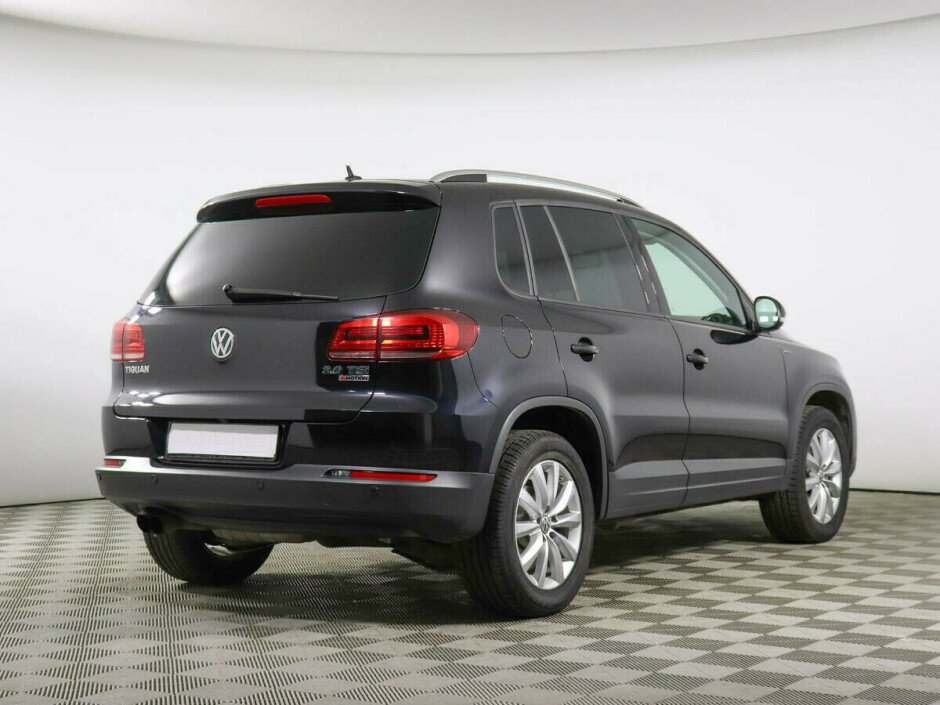 2012 Volkswagen Tiguan , Черный металлик - вид 3