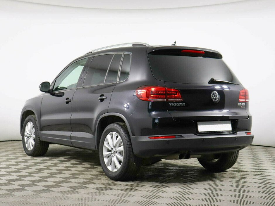 2012 Volkswagen Tiguan , Черный металлик - вид 4