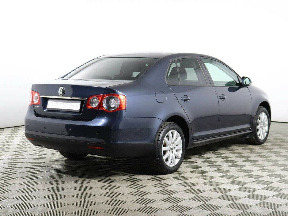 2009 Volkswagen Jetta , Синий металлик - вид 4