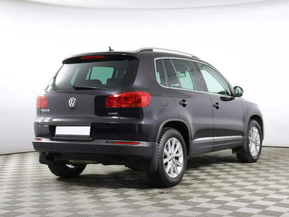 2012 Volkswagen Tiguan , Черный металлик - вид 3