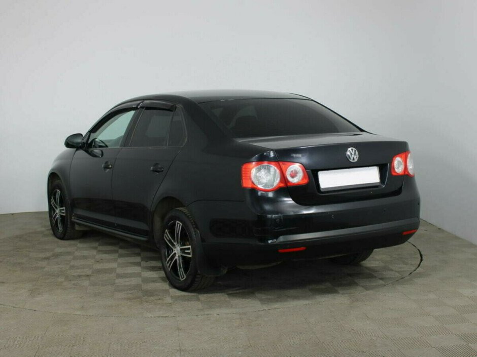 2009 Volkswagen Jetta , Черный металлик - вид 3