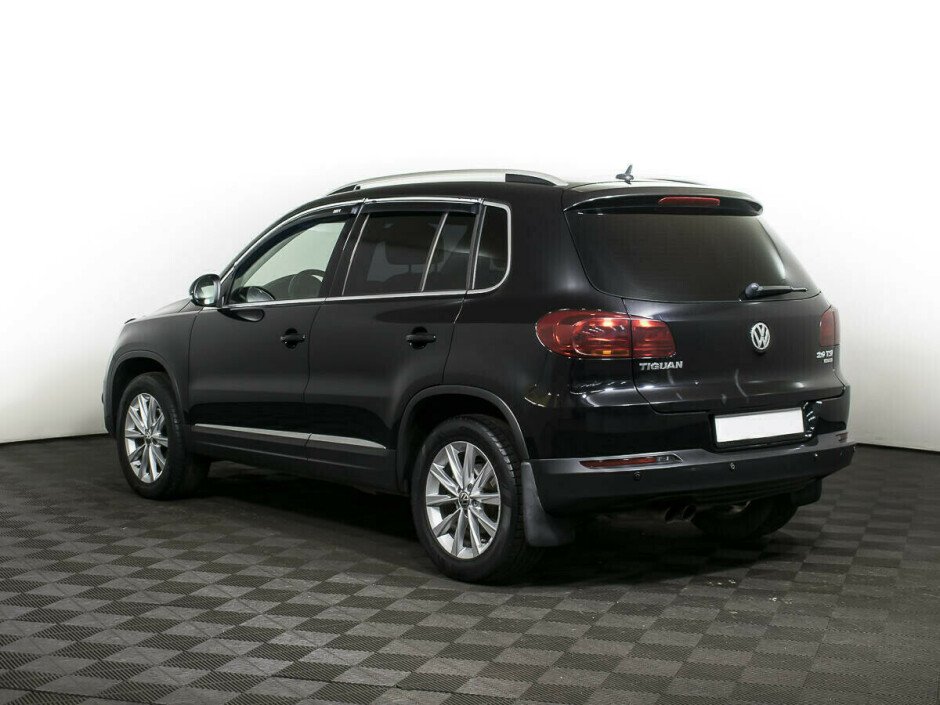 2012 Volkswagen Tiguan , Черный металлик - вид 4