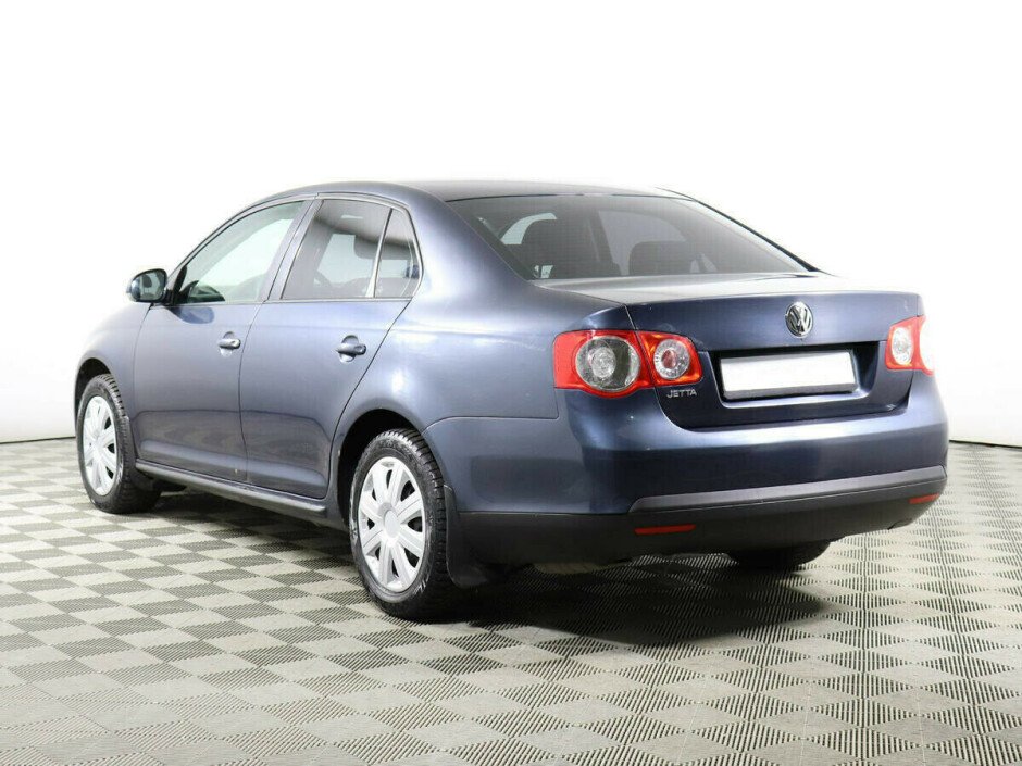 2010 Volkswagen Jetta , Синий металлик - вид 3